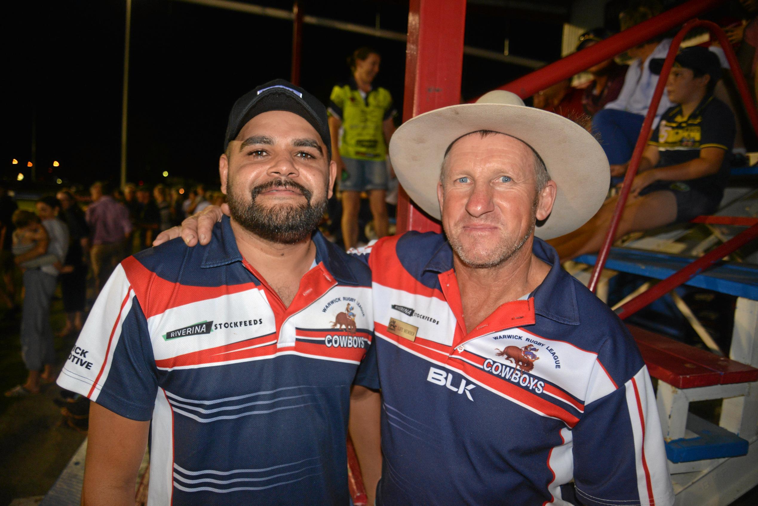 Cowboys player Lance McGrady with club volunteer Paul Hallman at the footy. Picture: Gerard Walsh