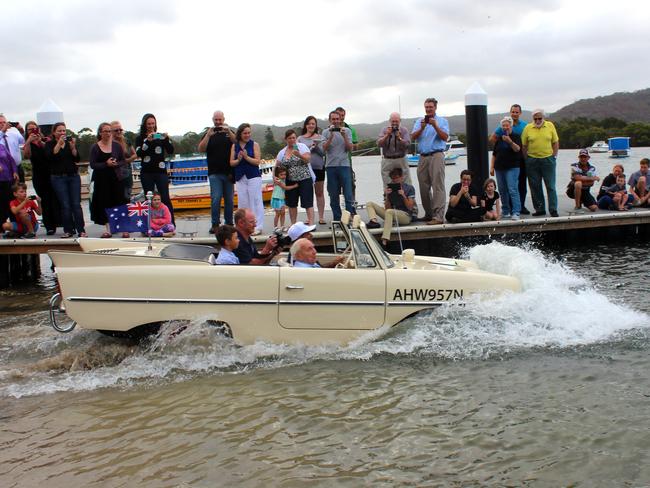 Rod Radford, 94 of Umina Beach, takes a ride in the Amphicar Model 770 at Woy Woy. Picture: MLB Photography.