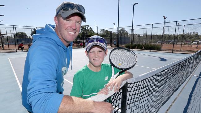 Jamie Atkinson and his son Cody Atkinson, who won the 12/U Boys division. Picture: Mike Batterham