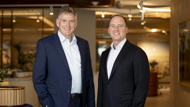 Former NAB boss Ross McEwan, left, will take charge from Ken MacKenzie, right, as the new chairman of BHP. Picture: Arsineh Houspian