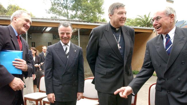 Pell had the ear of the powerful. In 2004 he is pictured with then Prime Minister John Howard and later Liberal leader Brendan Nelson. Picture: Erica Harrison 