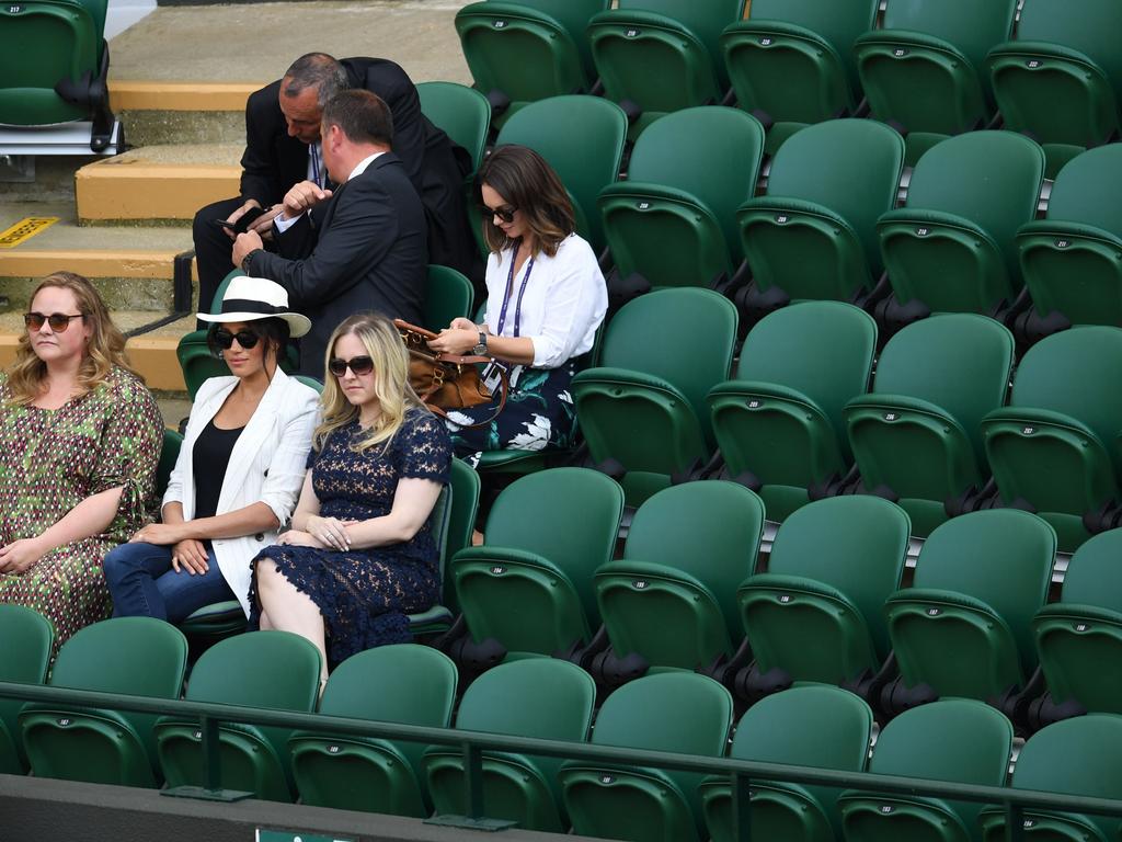 Meghan and her mates were surrounded by an exclusion zone of empty seats. Picture: James Veysey / Shutterstock