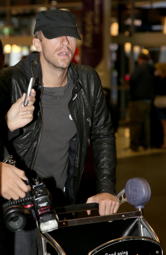 Bloody arrival... Chris Martin from Coldplay arrives at Sydney International Airport today. Picture: John Grainger