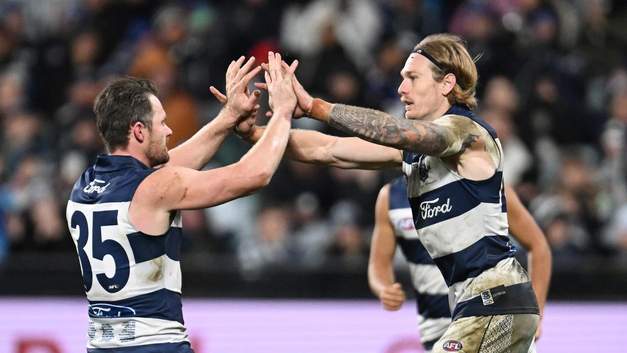 Patrick Dangerfield and Tom Stewart celebrate a goal. Picture: Daniel Pockett/Getty Images