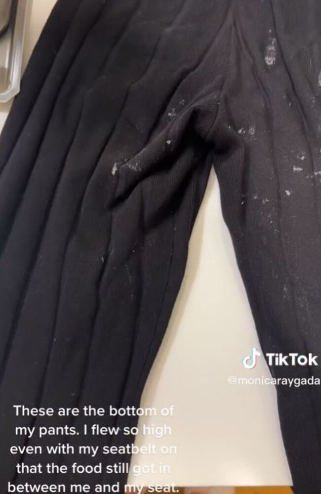 She shared footage of food all over her pants, saying she ‘flew so high’. Picture: Instagram/monicaraygada