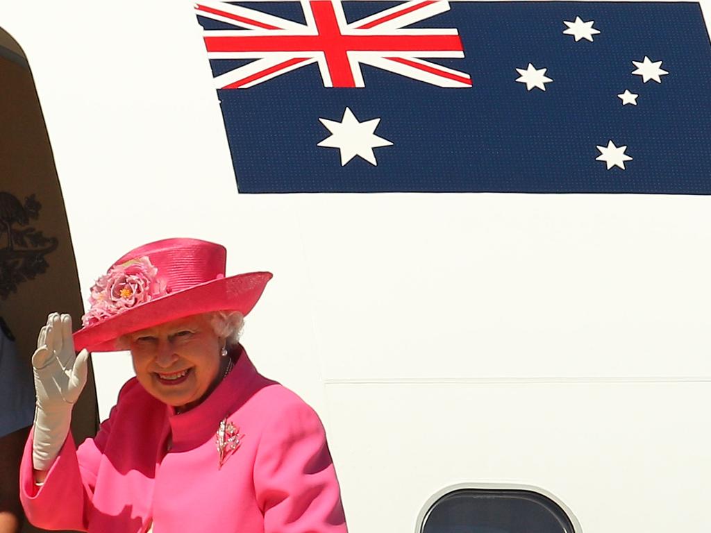 Queen Elizabeth II waved as she boarded her flight at Melbourne Airport on October 26, 2011. Picture: Getty Images