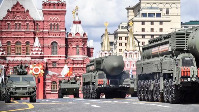 Russian intercontinental ballistic missile launchers parade through Red Square during the Victory Day military parade.