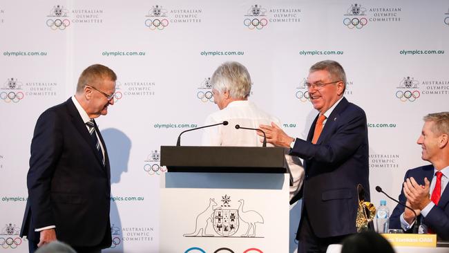 Raelene Boyle looked Thomas Bach (R) in eyes and demanded her gold medals.Picture: Getty