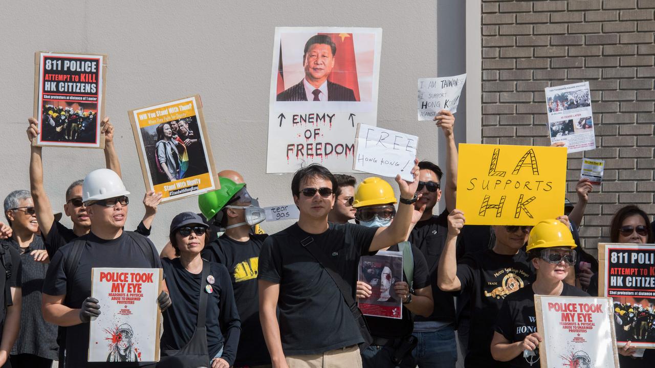 Members of the US Hong Kong community protest against what they say is police brutality against demonstrators during the ongoing Hong Kong protests, in Santa Monica, California on August 17, 2019. Picture: Mark Ralston / AFP