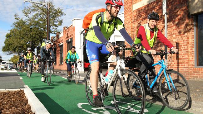 Cyclists riding along the Frome St bikeway. Picture: Stephen Laffer