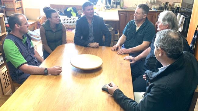 Southwest Victorian farmers Sam Wilson and Sam Andrew, Rural Assistance Commissioner Peter Tuohey, Australian Dairy Farmers president Ben Bennett, United Dairyfarmers of Victoria president Bernie Free and Australian Dairy Farmers chief executive Steve Sheridan.