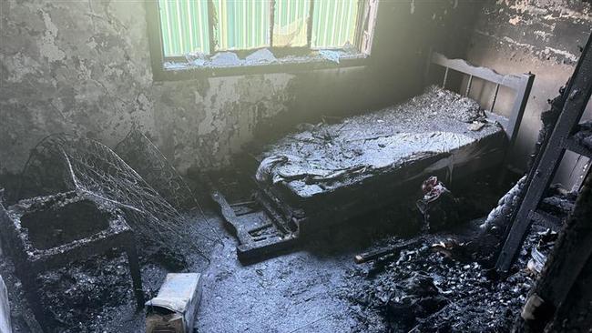 Chilling photos show the aftermath of the lithium battery explosion inside a bedroom. Picture: Fire and Rescue NSW