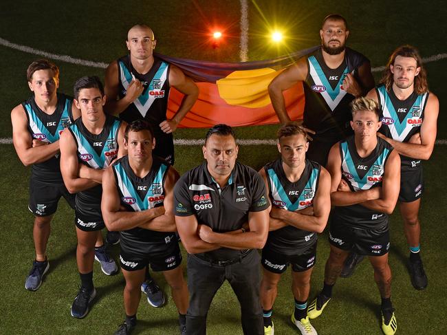 Port Adelaide Indigenous players in 2019 with Paul Vandenbergh. Back: Sam Powell-Pepper, Paddy Ryder Front: Tobin Cox, Joel Garner, Steven Motlop, Karl Amon, Aidyn Johnson., Jarrod Lienert with Paul Vandenbergh. Picture: Naomi Jellicoe