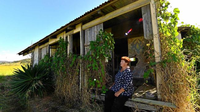 Milojevic Djordjevic's daughter Linda at the derelict shed on Yandina-Coolum Road. Picture: John McCutcheon