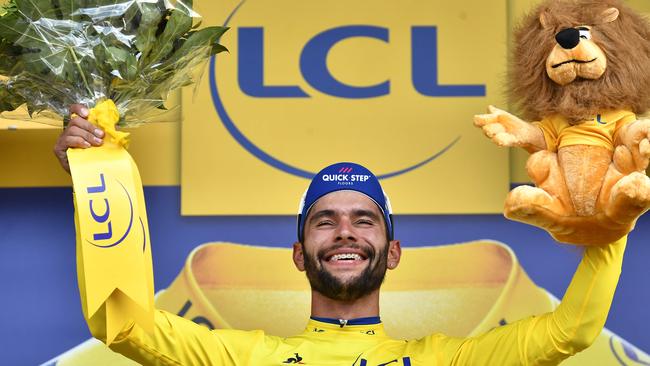 Colombia's Fernando Gaviria dons the yellow jersey. Photo: AFP