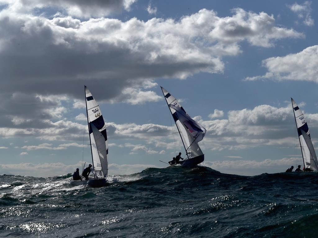 Mathew Belcher and Will Ryan of Australia, Sofian Bouvet and Jeremie Mion of France, and Panagiotis Mantis and Pavlos Kagialis of Greece compete in the men’s 470 class.