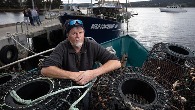 Perryman stands by his pots on his Minnamurra 2 while docked at Margate in Southern Tasmania. Picture: Peter Mathew