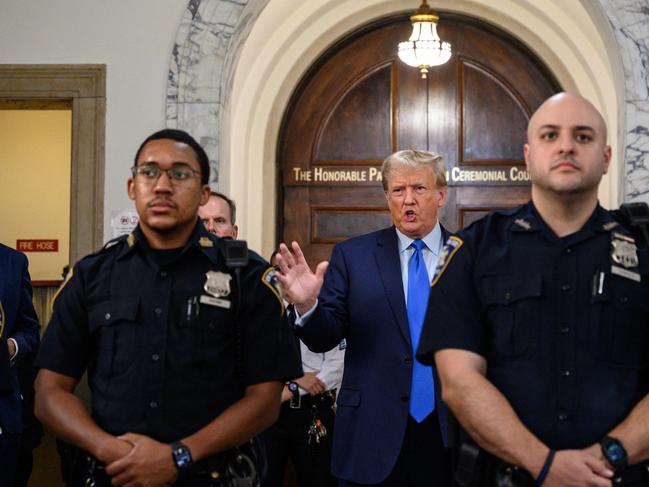 Former US President Donald Trump lets loose outside court. Picture: AFP