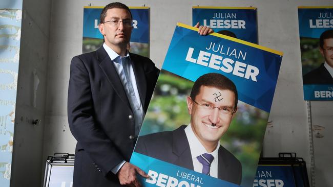 Julian Leeser, MP for Berowra in Sydney's North, has had several of his campaign posters defaced overnight with Nazi Swastikas. The Jewish politician is distressed and angry about it. Picture: David Swift