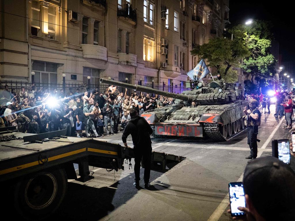 Members of Wagner group prepare to pull out from the headquarters of the Southern Military District to return to their base in Rostov-on-Don late on June 24.