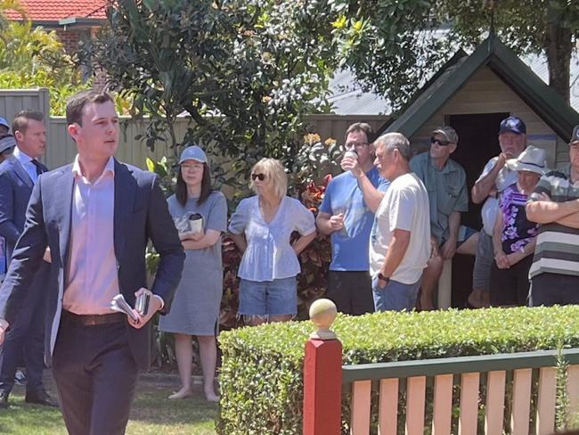 QLD REAL ESTATE: Some of the crowd at 8 Kentwell Place, Wishart.