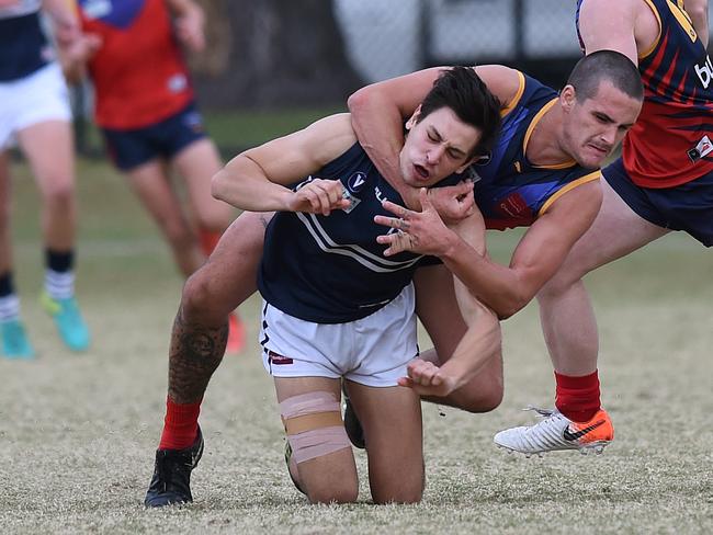 Caulfield's Nicholas Baltas and Parkdale's Harley Balic. Picture: Josie Hayden