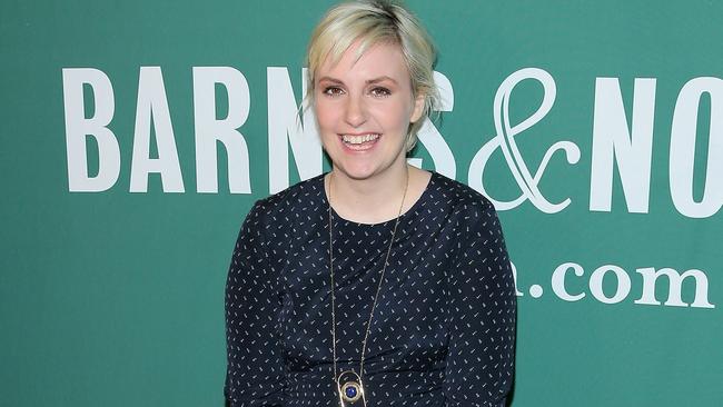 Book tour ... Girls creator Lena Dunham at a book signing in New York City. Dunham faced a backlash it emerged she wasn’t going to pay artists to appear at her book tour. Picture: AFP