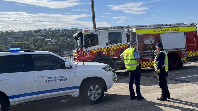 Several outbound lanes were closed on the Spit Bridge as emergency crews worked to clear the scene. Picture: NewsWire / Ben Symons