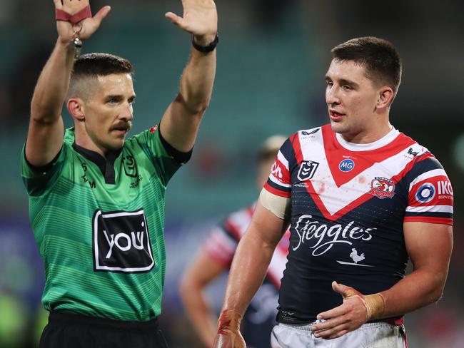 SYDNEY, AUSTRALIA - MAY 22:  Victor Radley of the Roosters is sent to the sin bin by referee Peter Gough as James Tedesco looks on during the round 11 NRL match between the Sydney Roosters and the Brisbane Broncos at Sydney Cricket Ground, on May 22, 2021, in Sydney, Australia. (Photo by Matt King/Getty Images)