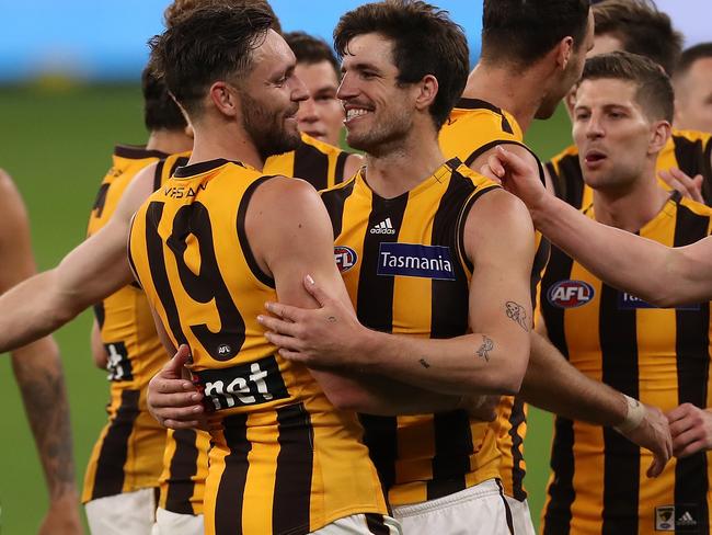 PERTH, AUSTRALIA - JULY 31: Jack Gunston and Ben Stratton of the Hawks celebrate after winning the round nine AFL match between the Carlton Blues and the Hawthorn Hawks at Optus Stadium on July 31, 2020 in Perth, Australia. (Photo by Paul Kane/Getty Images)