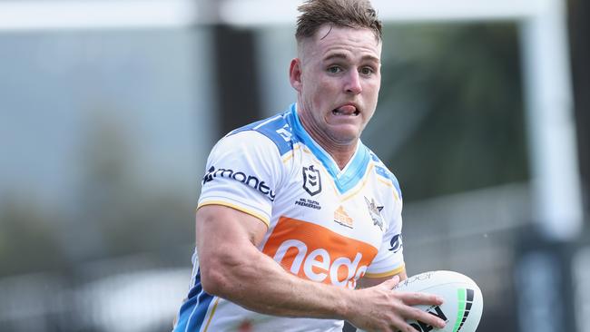 GOSFORD, AUSTRALIA - MARCH 13: AJ Brimson of the Gold Coast Titans runs the ball during the round one NRL match between the New Zealand Warriors and the Gold Coast Titans at Central Coast Stadium, on March 13, 2021, in Gosford, Australia. (Photo by Ashley Feder/Getty Images)