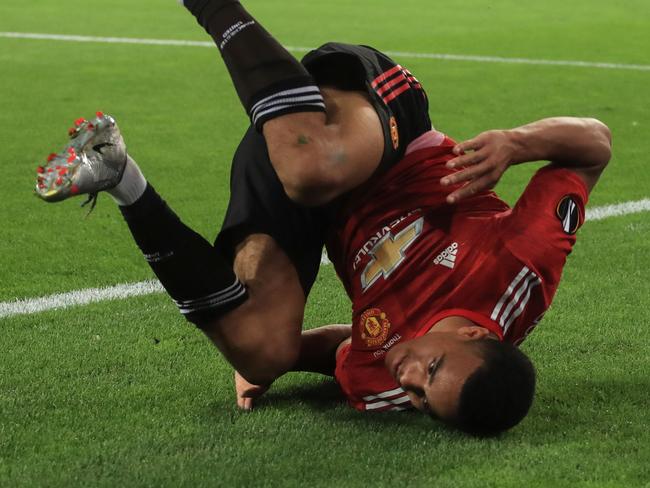 Manchester United's English forward Mason Greenwood reacts after scoring a goal which has been then cancelled during the UEFA Europa League quarter-final football match between Manchester United and FC Copenhagen at the RheinEnergieStadion, in Cologne, western Germany, on August 10, 2020. (Photo by WOLFGANG RATTAY / POOL / AFP)