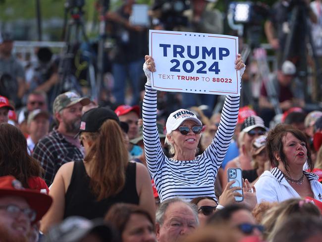 Supporters at a rally in Racine, Wisconsin listen as Donald Trump speaks. Picture: Getty Images via AFP.