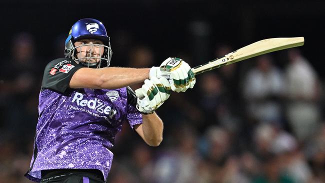 HOBART, AUSTRALIA - JANUARY 10: Tim David of the Hurricanes hits a six during the BBL match between Hobart Hurricanes and Sydney Thunder at Blundstone Arena, on January 10, 2025, in Hobart, Australia. (Photo by Steve Bell/Getty Images)