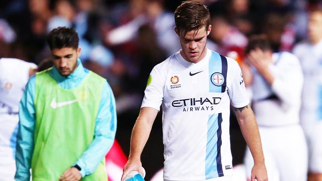 Despondent Melbourne City players leave the field after their A-League semi final loss to Adelaide United. Picture: Morne de Klerk/Getty Images