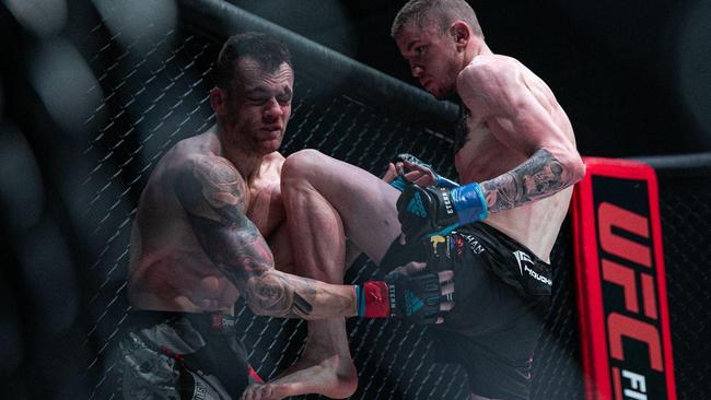 Toowoomba MMA fighter Tom "Big Train" Nolan in action against Trevor Sinclair during their bout at Carrara Stadium on the Gold Coast, November 20, 2021.