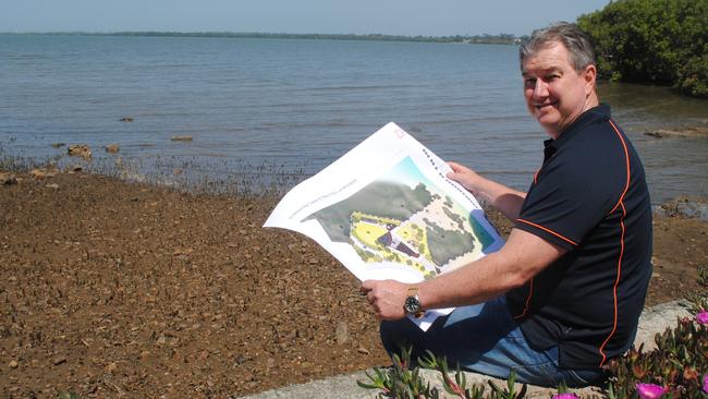 Moreton Bay Regional Councillor Peter Flannery (Div 2) with the plan for the DPI building at Deception Bay. Photo: supplied