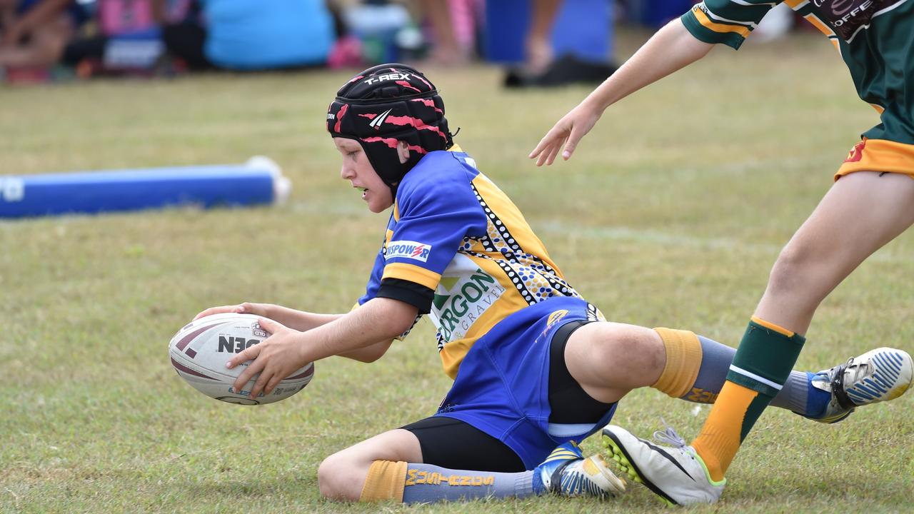 Clydesdales’ Fletch Prendergast goes into score for Murgon as an under-12 player.