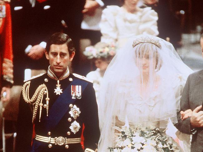 Prince Charles and Princess Diana with her young bridesmaids in tow. Picture: AFP