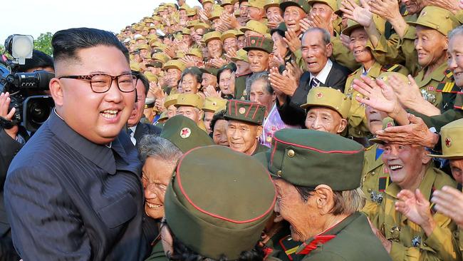 North Korean leader Kim Jong Un meets with participants of the 5th National Conference of War Veterans in front of the Fatherland Liberation War Martyrs Cemetery in Pyongyang. Picture: AFP