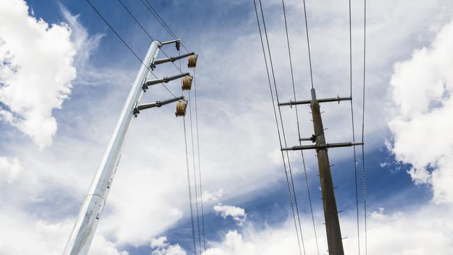 Power lines set up by wind farms near Noorat in Victoria. Picture: Dannika Bonser