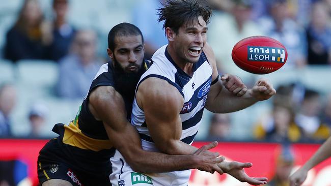 Bachar Houli tackles Tom Hawkins. Picture: Michael Klein