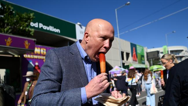 Peter Dutton realised there was no good way to eat the popular Ekka treat. Picture: NCA NewsWire / Dan Peled