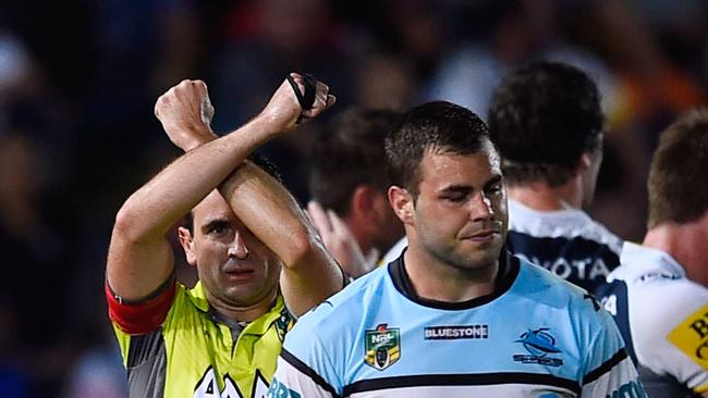 TOWNSVILLE, AUSTRALIA - SEPTEMBER 19: Wade Graham of the Sharks is placed on report during the Second NRL Semi Final match between the North Queensland Cowboys and the Cronulla Sharks at 1300SMILES Stadium on September 19, 2015 in Townsville, Australia. (Photo by Ian Hitchcock/Getty Images)