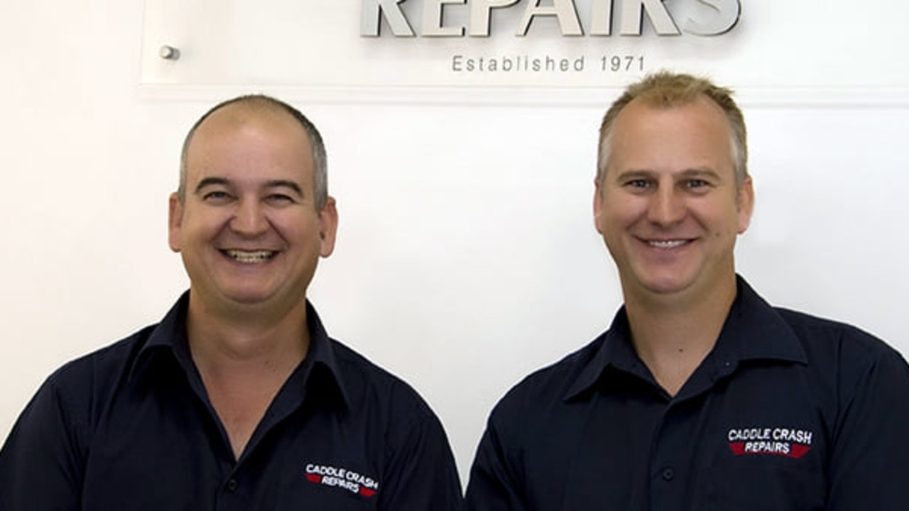 Brothers Michael (right) and Brenton at their family business, Caddle Crash Repairs. Picture: Facebook