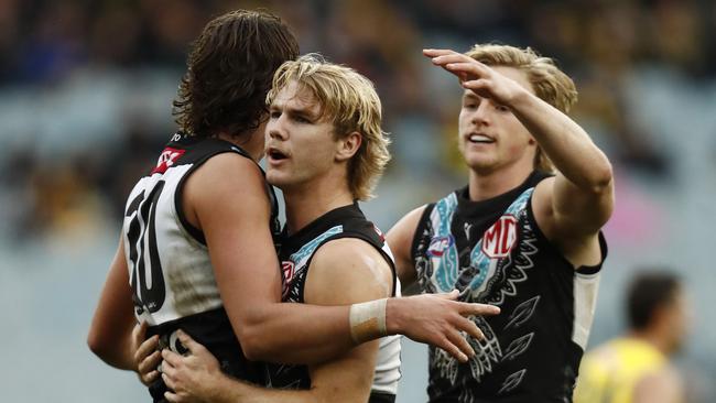 Jason Horne-Francis celebrates a goal against Richmond. Picture: Darrian Traynor/AFL Photos/via Getty Images