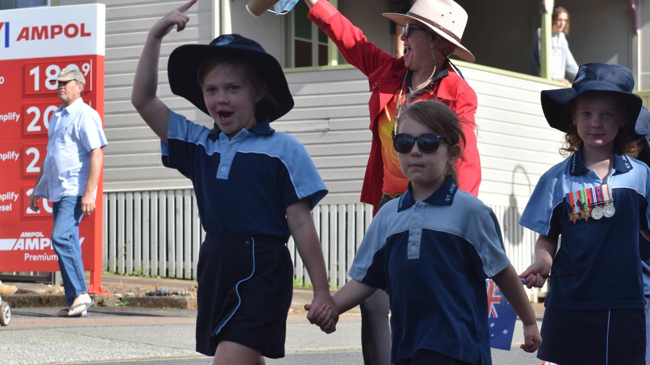 Young students from St. Joseph's Primary School in Alstonville join the march during the ANZAC DAY parade on Main Street in Alstonville Picture: Nicholas Rupolo.