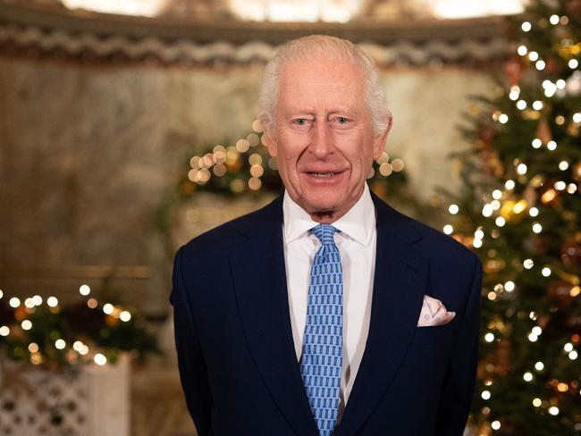 Britain's King Charles III smiles during the recording of his Christmas message at the Fitzrovia Chapel in central London. Picture: AFP