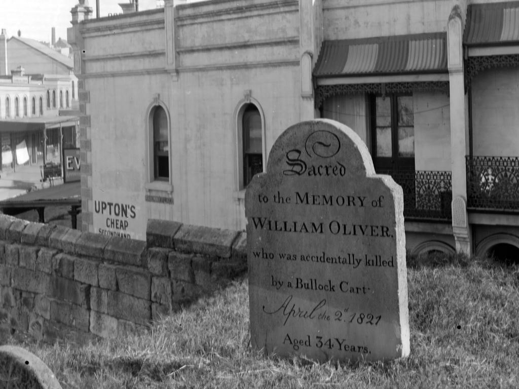 A tombstone in the cemetery before the ground was levelled for Central Station.