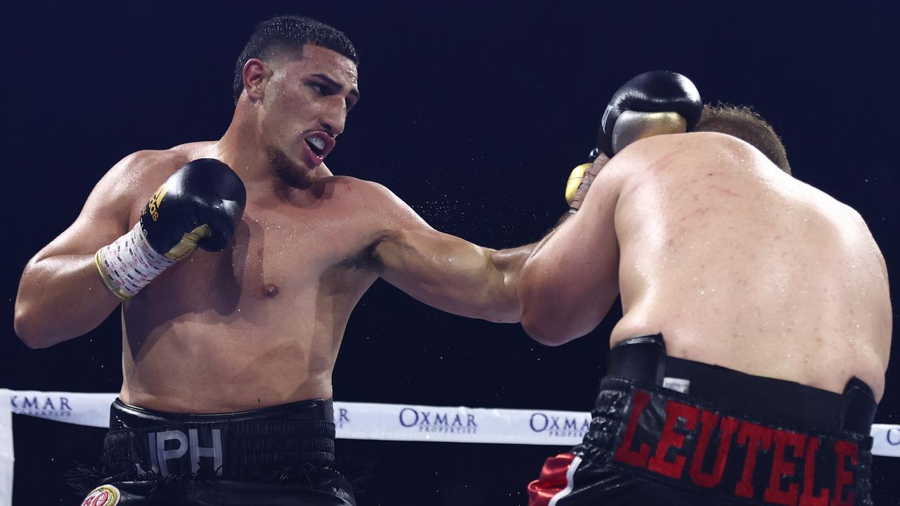 BRISBANE, AUSTRALIA - NOVEMBER 04: Justis Huni punches Kiki Toa Leutele during the bout between Justis Huni and Kiki Toa Leutele at Nissan Arena on November 04, 2022 in Brisbane, Australia. (Photo by Chris Hyde/Getty Images)